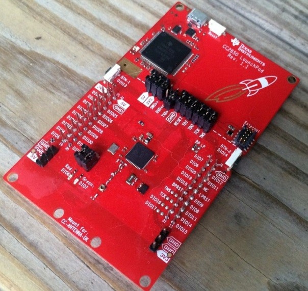 A red circuit board with black and white components

AI-generated content may be incorrect.